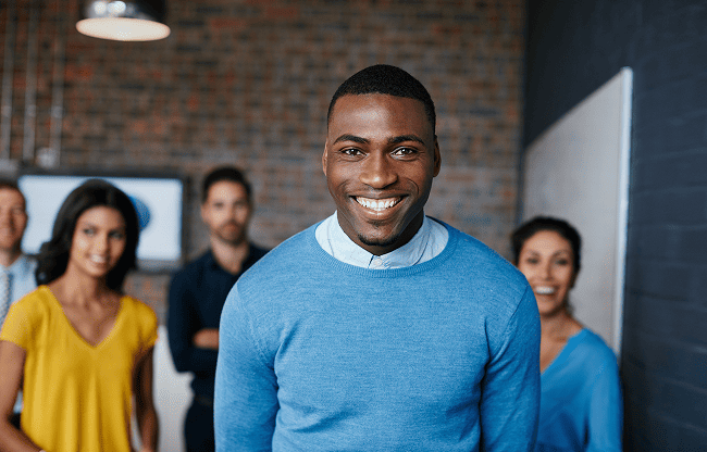 Four Sudatel employees representing our rewards and benefits programme